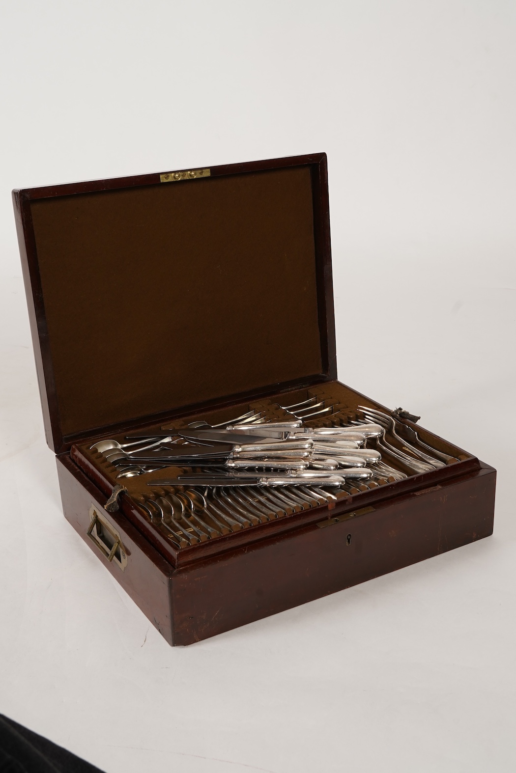 A George V canteen of silver Hanoverian rat tail flatware, by Mappin & Webb